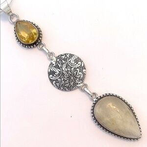 3 1/2 inch, Sri-Lankan Moonstone and Citrine pendant on a silver chain.